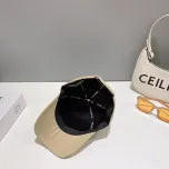 White, Grey and Black Caps Prada