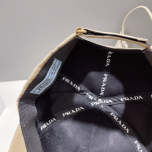 White, Grey and Black Caps Prada