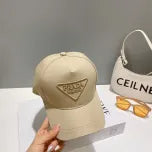 White, Grey and Black Caps Prada