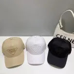 White, Grey and Black Caps Prada