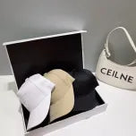 White, Grey and Black Caps Prada